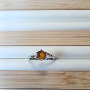 Beautiful fire opal ring with inclusions .925 sterling silver